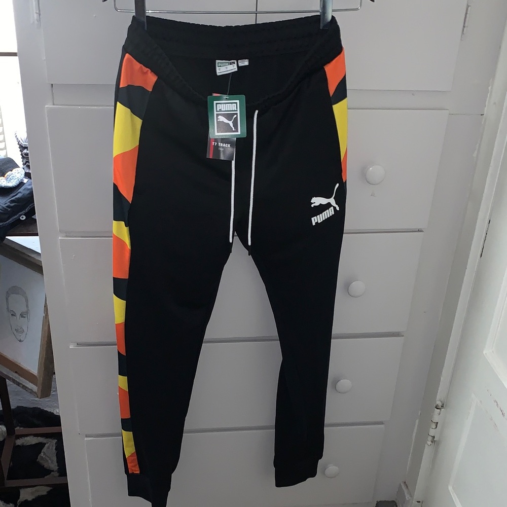 PUMA Black Joggers with Orange and Yellow Accents